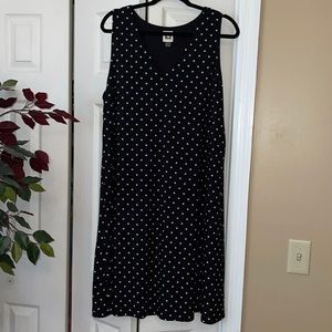 Fully lined Anne Klein dress. Black with polka dots. Some stretch.
